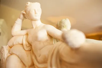Roman Bungalow gladiator suite with romantic Roman styling